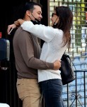 Katie Holmes and Emilio Vitolo are all smiles as they continue another steamy make-out session outside his restaurant in NYC