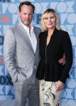 Russell Thomas and actress Kim Cattrall arrive at the FOX Summer TCA 2019 All-Star Party held at Fox Studios on August 7, 2019 in Los Angeles, California, United States.