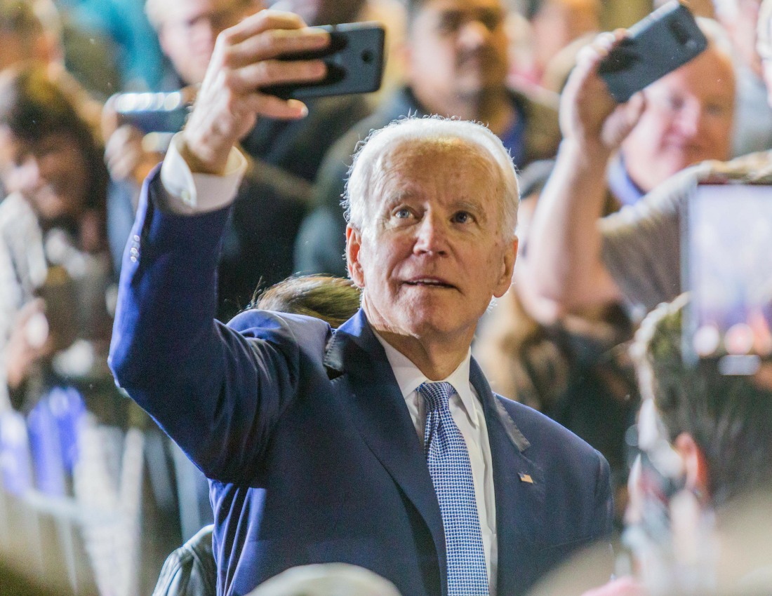 Former Vice President Joe Biden, 2020 Democratic presidential candidate, takes a 'selfie' photograph...