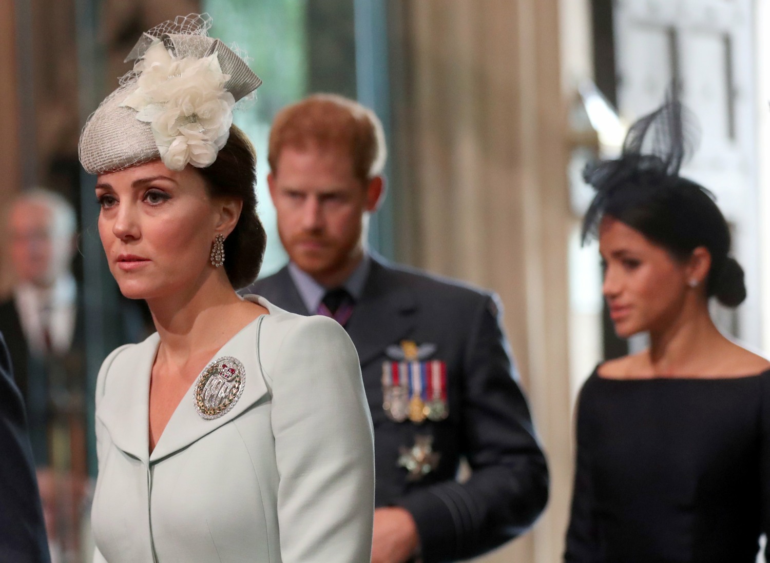 Britain's Prince Harry, his wife Meghan, the Duke and Duchess of Sussex, and Catherine, Duchess of Cambridge arrive at Westminster Abbey for a service to mark the centenary of the Royal Air Force