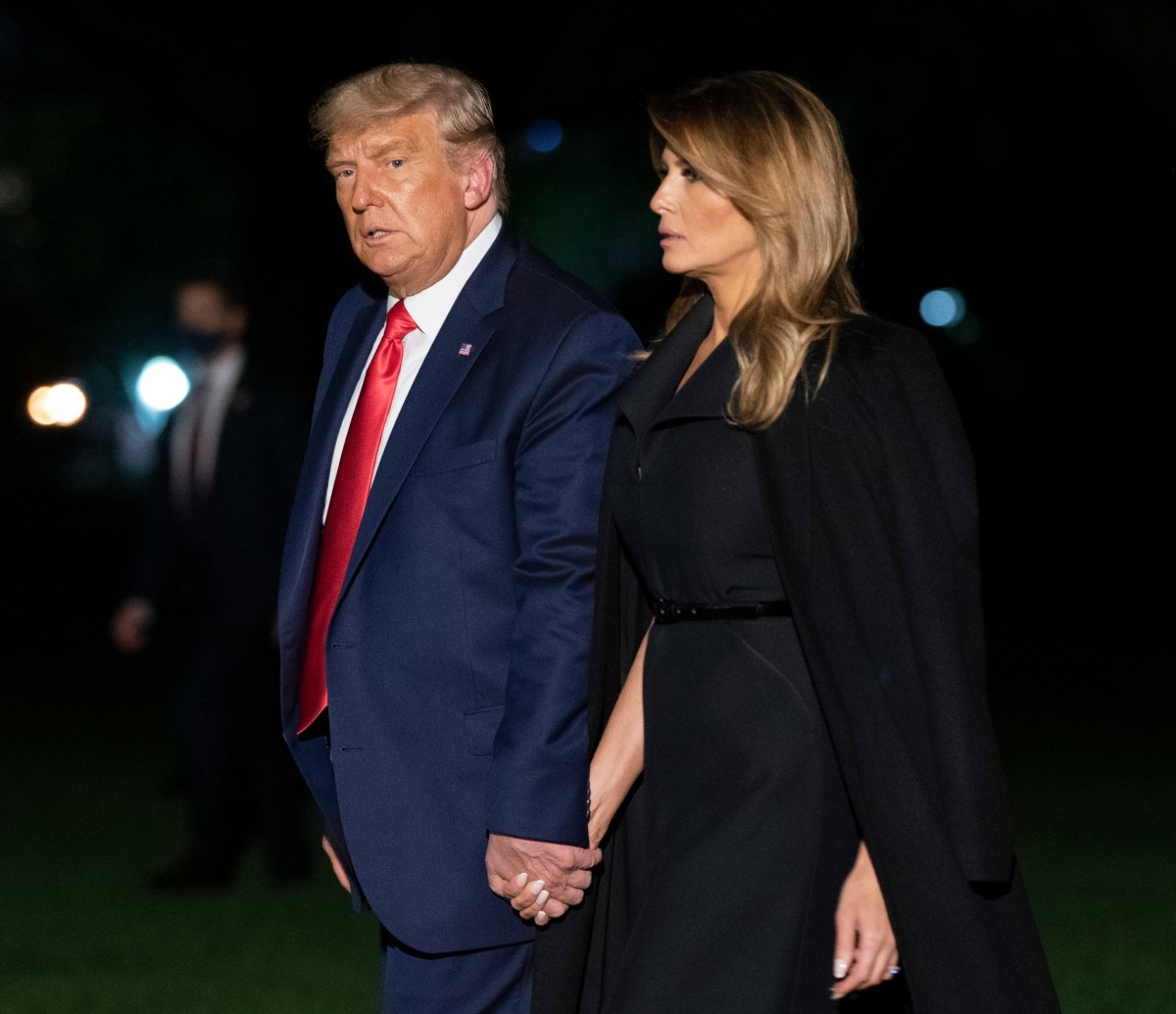 President Donald J. Trump  and First lady Melania Trump return to the White House