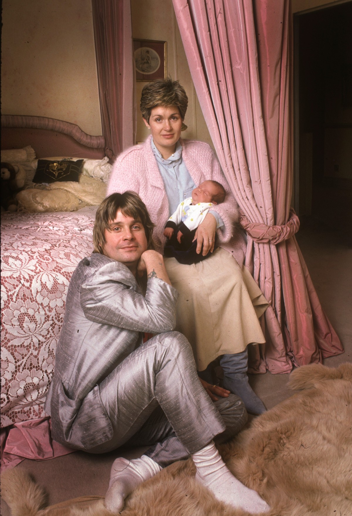 Ozzy Osbourne with Sharon and Baby Jack At their Home Hampstead . London . 1985