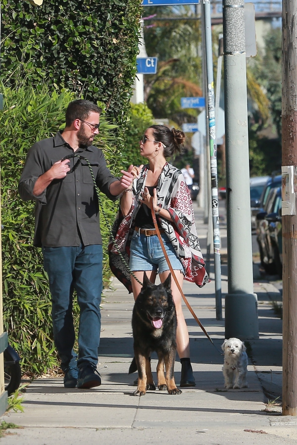 Ben Affleck and Ana de Armas take their dogs out for an evening stroll