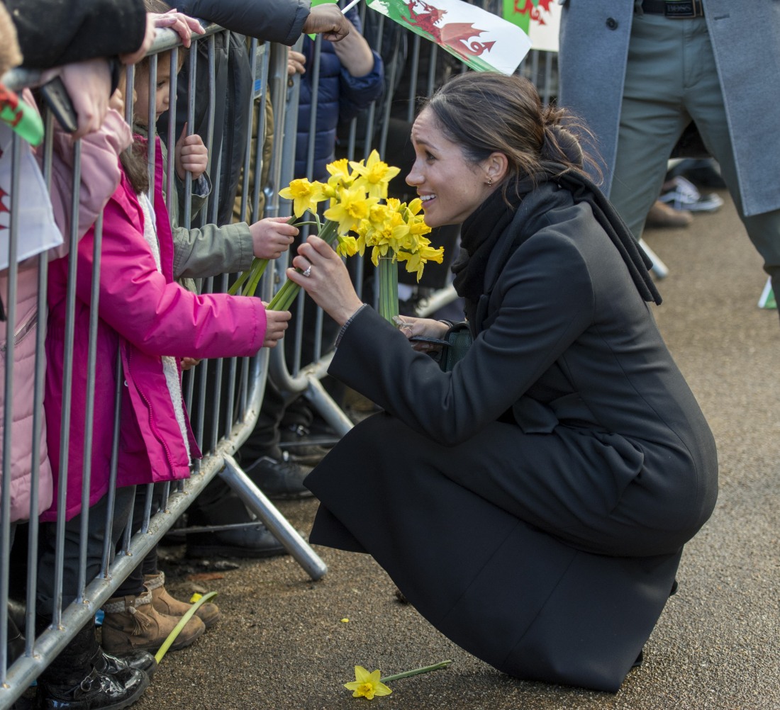 Prince Harry and Meghan Markle  visited Cardiff Castle and met  members of the local community gathered within the grounds.
