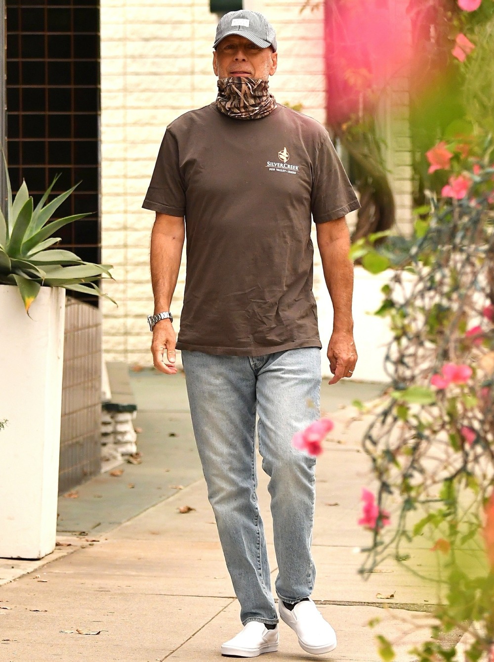 Bruce Willis goes for a Care Free Walk in the neighborhood