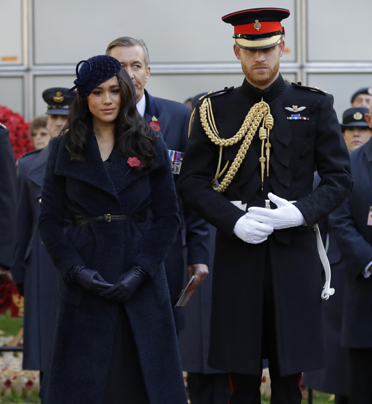 Britain's Prince Harry and Meghan, the Duchess of Sussex attend the 91st Field of Remembrance at Westminster Abbey in London, Thursday, Nov. 7, 2019.