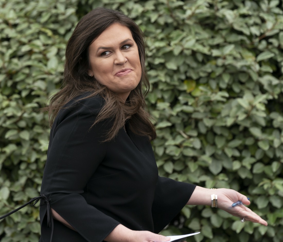 White House spokesperson Sarah Sanders speaks to the media at the White House