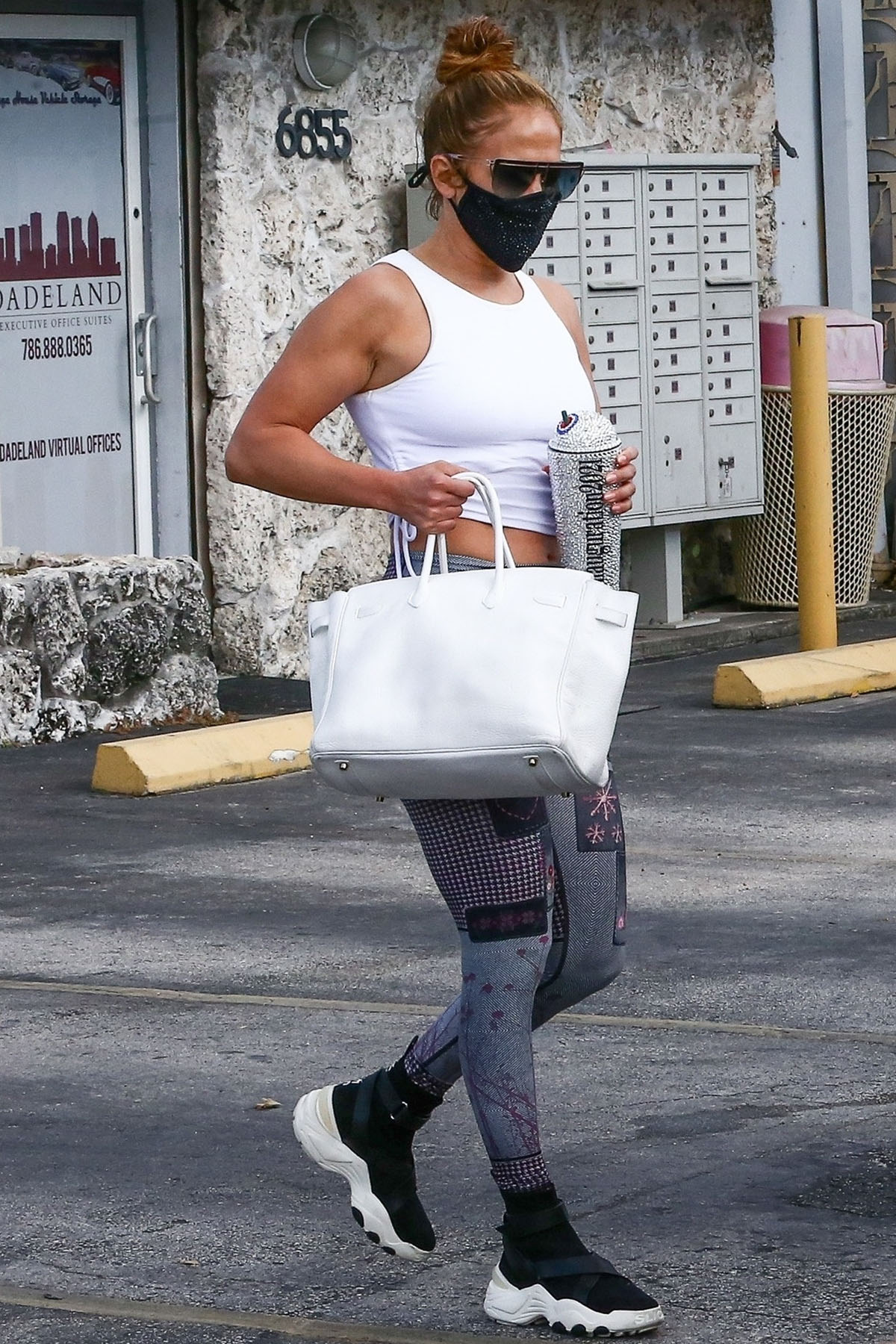 Jennifer Lopez shows off toned arms as she wraps up at the gym in Miami