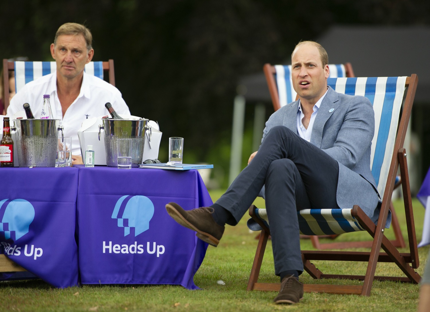 The Duke of Cambridge hosts an outdoor screening of the Heads Up FA Cup final on the Sandringham Estate. William watches with Tony Adams as Chelsea score.   1.8.2020