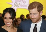 Prince Harry and Meghan Markle attend a Women's Empowerment Reception