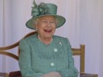 The Queen seen laughing while enjoying a celebration to mark her official birthday