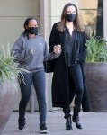 Angelina Jolie holds hands with her daughter Zahara while out shopping