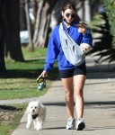 Lucy Hale goes on a walk with her two dogs for an iced coffee