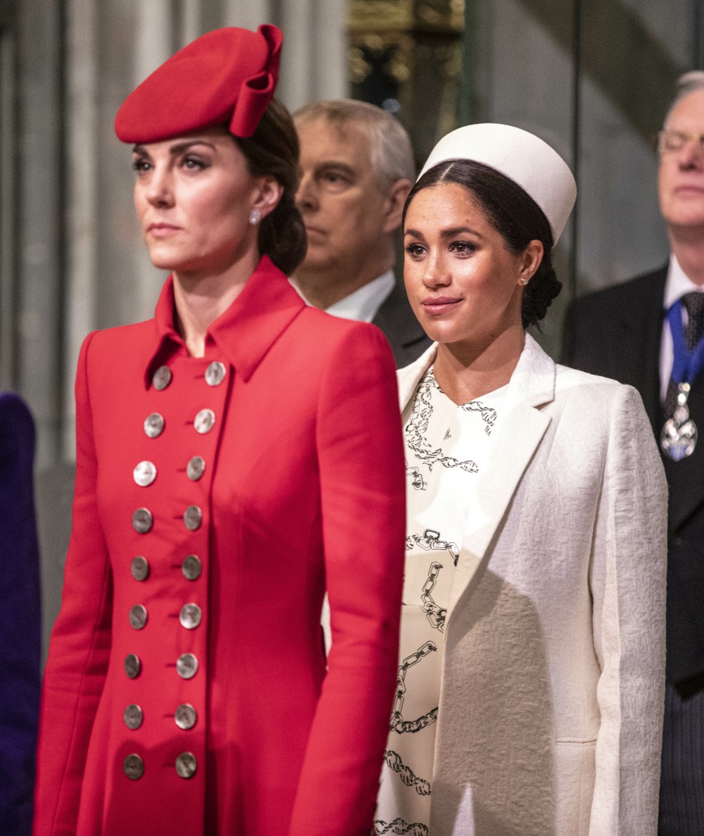 The Duchess of Cambridge stands with the Duchess of Sussex at Westminster Abbey