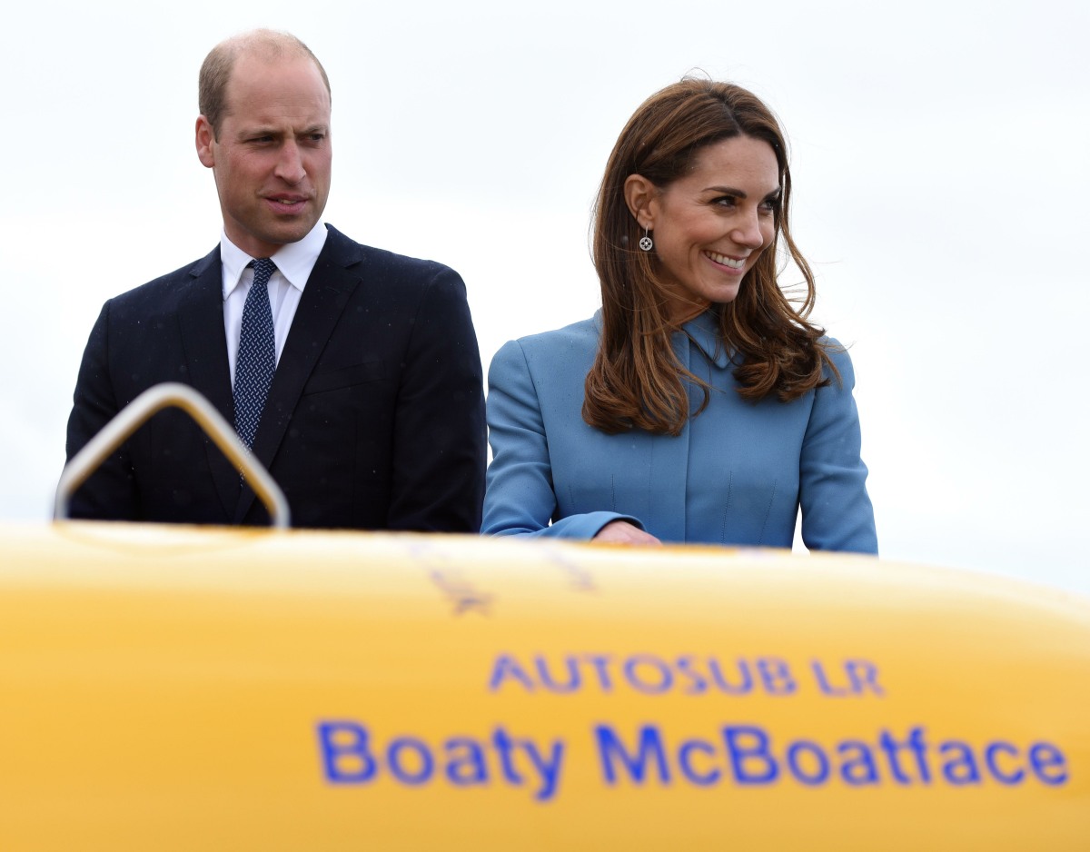 The Duke and Duchess of Cambridge attend the naming of the RRS Sir David Attenborough at Camel Laird shipyard, Birkenhead.  They are standing on the helideck in front of the unmanned submarine Boaty McBoatface.