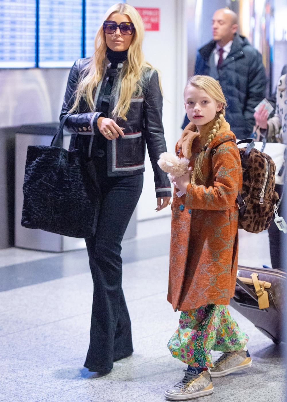 Jessica Simpson with daughter Maxwell and mother get ready to leave NYC