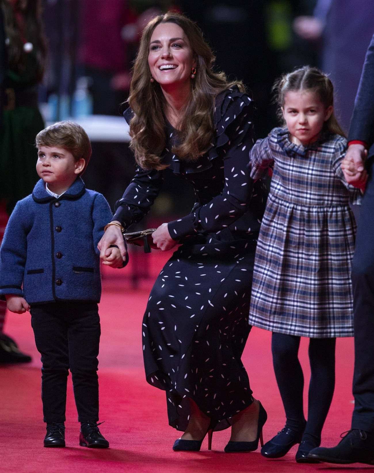 The Cambridge Family attend a special Christmas Pantomime performance at London's Palladium Theatre