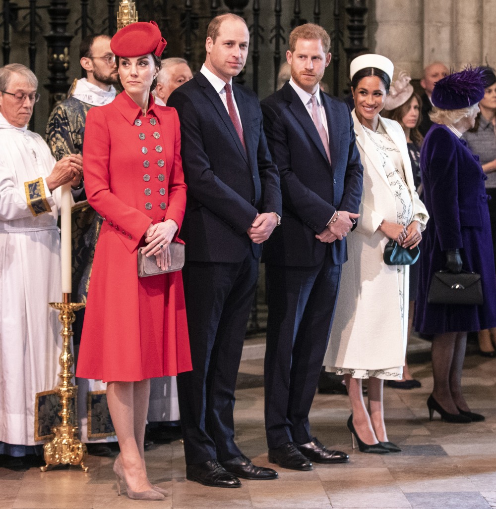 The Duke and duchess of Cambridge stand with the duke and Duchess of Sussex at W