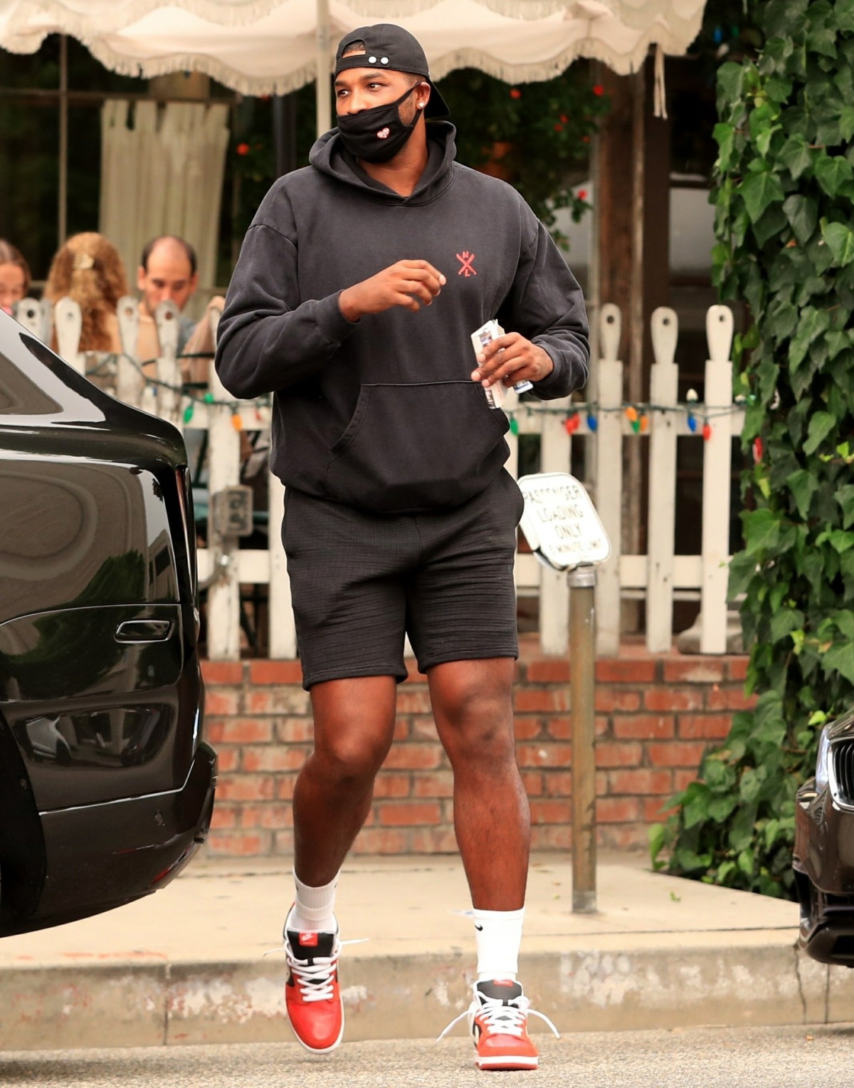 Tristan Thompson meets up with a friend for lunch at celeb hot spot The Ivy