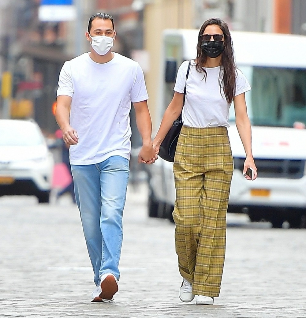 Katie Holmes and Emilio Vitolo Jr clutch hands in NYC