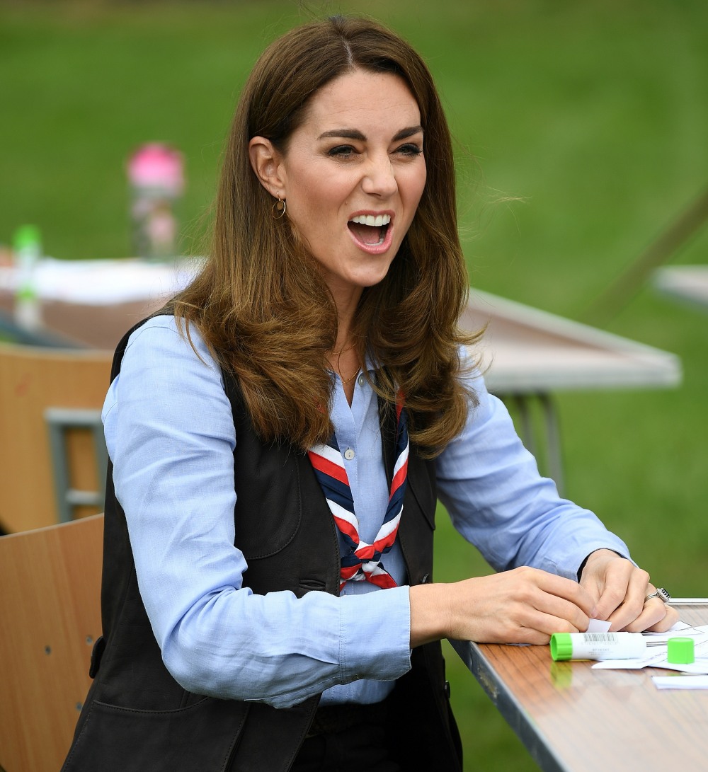 Britain's Catherine, Duchess of Cambridge talks with members of the Beavers as she visits a Scout Group in Northolt, northwest London on September 29, 2020, where she joined Cub and Beaver Scouts in outdoor activities. - The Duchess learned how the Scouts have adapted during the COVID-19 pandemic, and continued Scouting sessions and online activities.