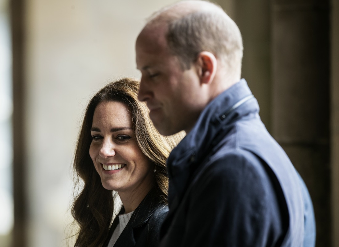 Britain's Catherine, Duchess of Cambridge and Britain's Prince William, Duke of Cambridge visit the University of St Andrews in St Andrews on May 26, 2021.