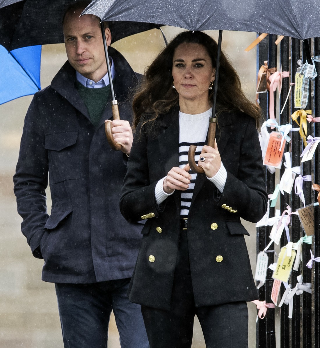 Britain's Catherine, Duchess of Cambridge and Britain's Prince William, Duke of Cambridge visit the University of St Andrews in St Andrews on May 26, 2021.