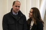 Britain's Catherine, Duchess of Cambridge and Britain's Prince William, Duke of Cambridge meet students as they visit the University of St Andrews in St Andrews on May 26, 2021.