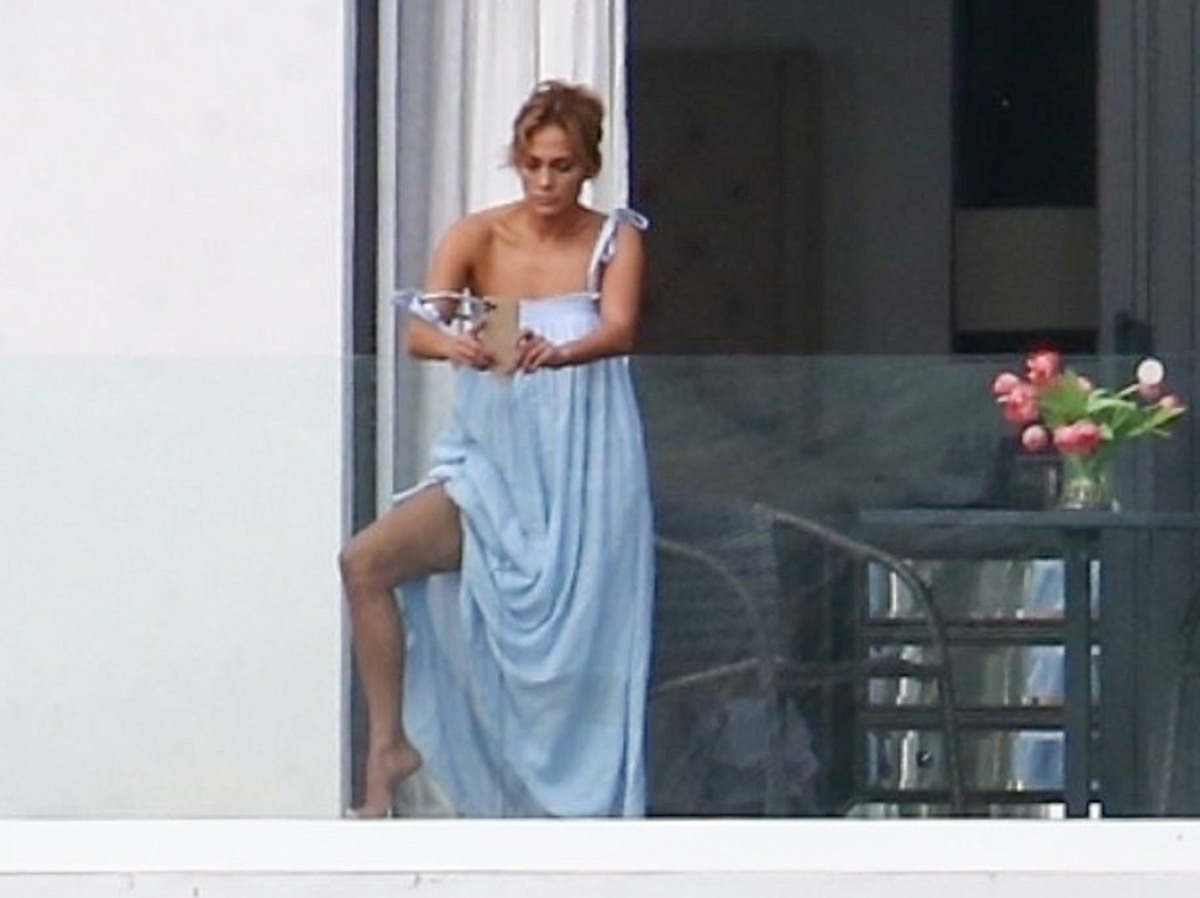 Jennifer Lopez snaps selfies on the balcony of her and Ben Affleck's Miami Beach waterfront mansion