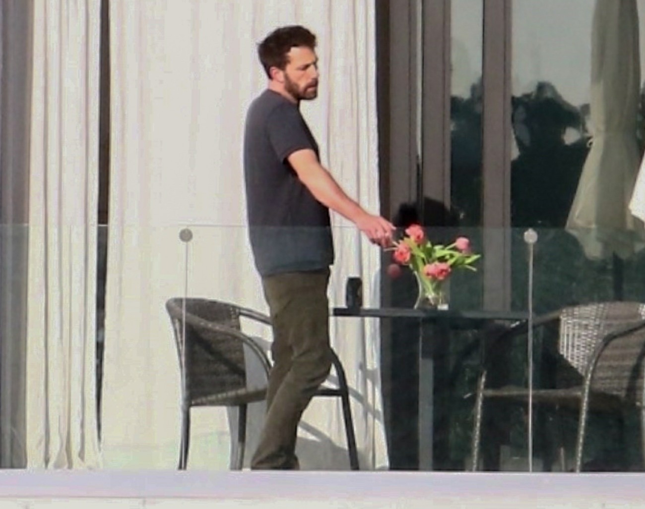 Ben Affleck steps out for a smoke at he and Jennifer Lopez's Miami Beach Love Nest!
