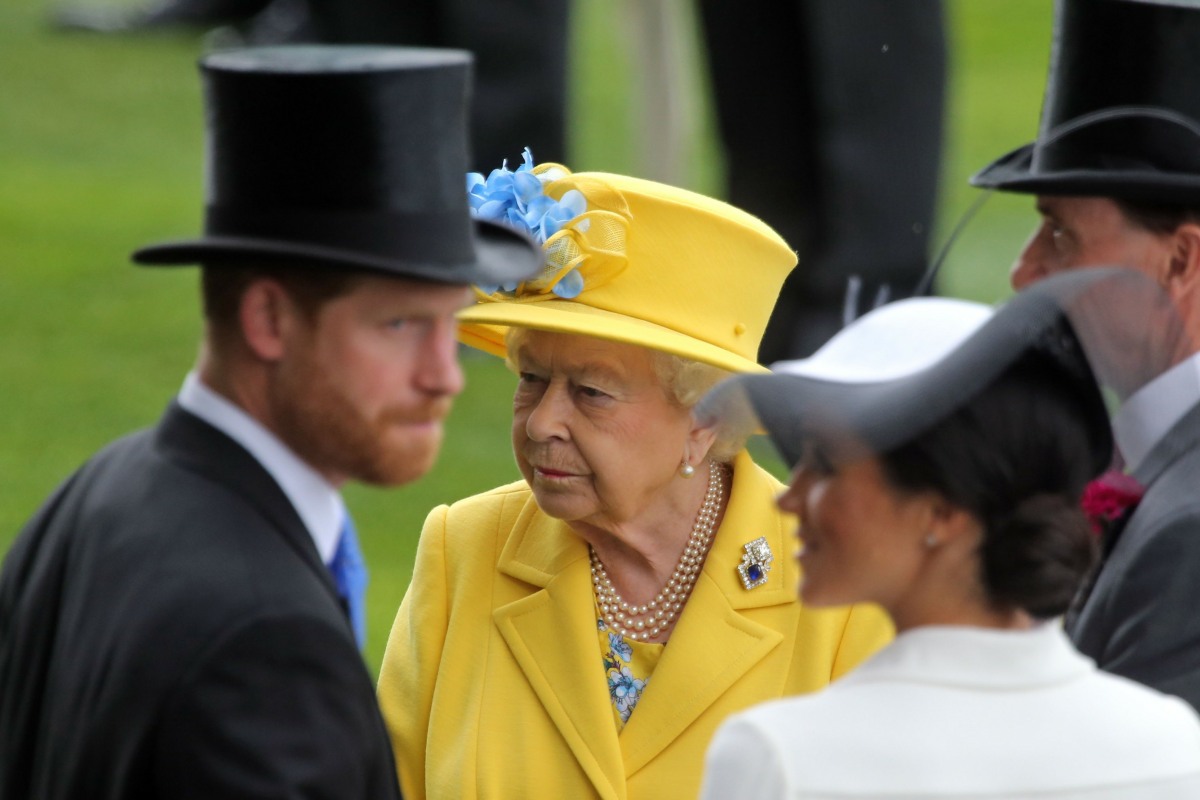 Royal Ascot, Portrait of HRH Queen Elizabeth the Second behind TRH Harry the Duke of Sussex and TRH Meghan the Duchess of Sussex