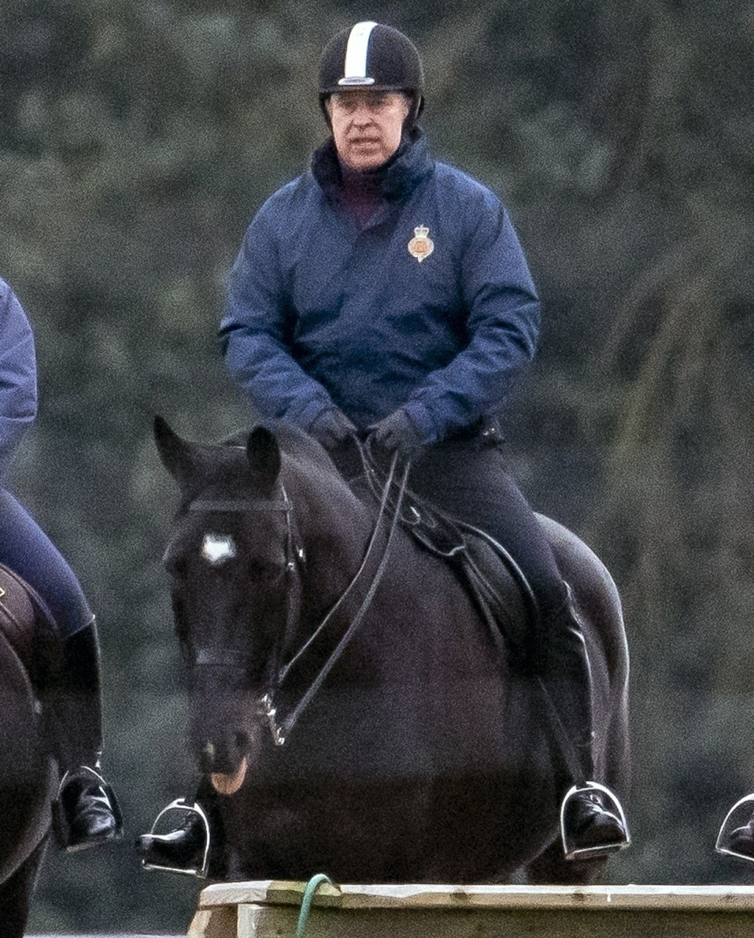 Prince Andrew looks at ease riding in Windsor Park