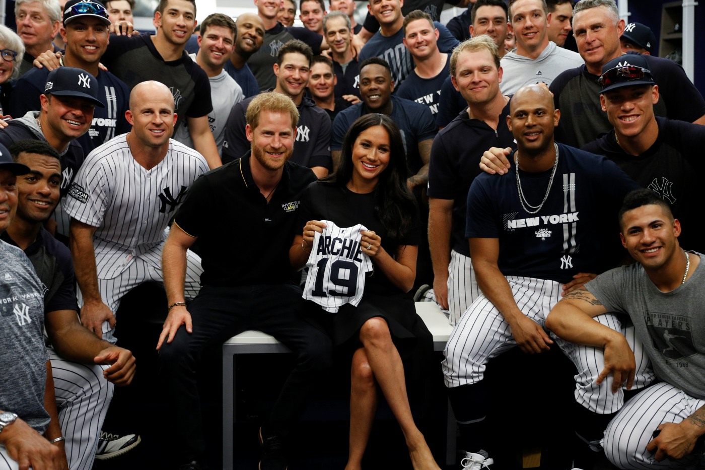 Britain's Prince Harry and Meghan, Duchess of Sussex attend the Boston Red Sox v New York Yankees match in London