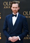 Tom Hiddleston attends the Olivier Awards in London
