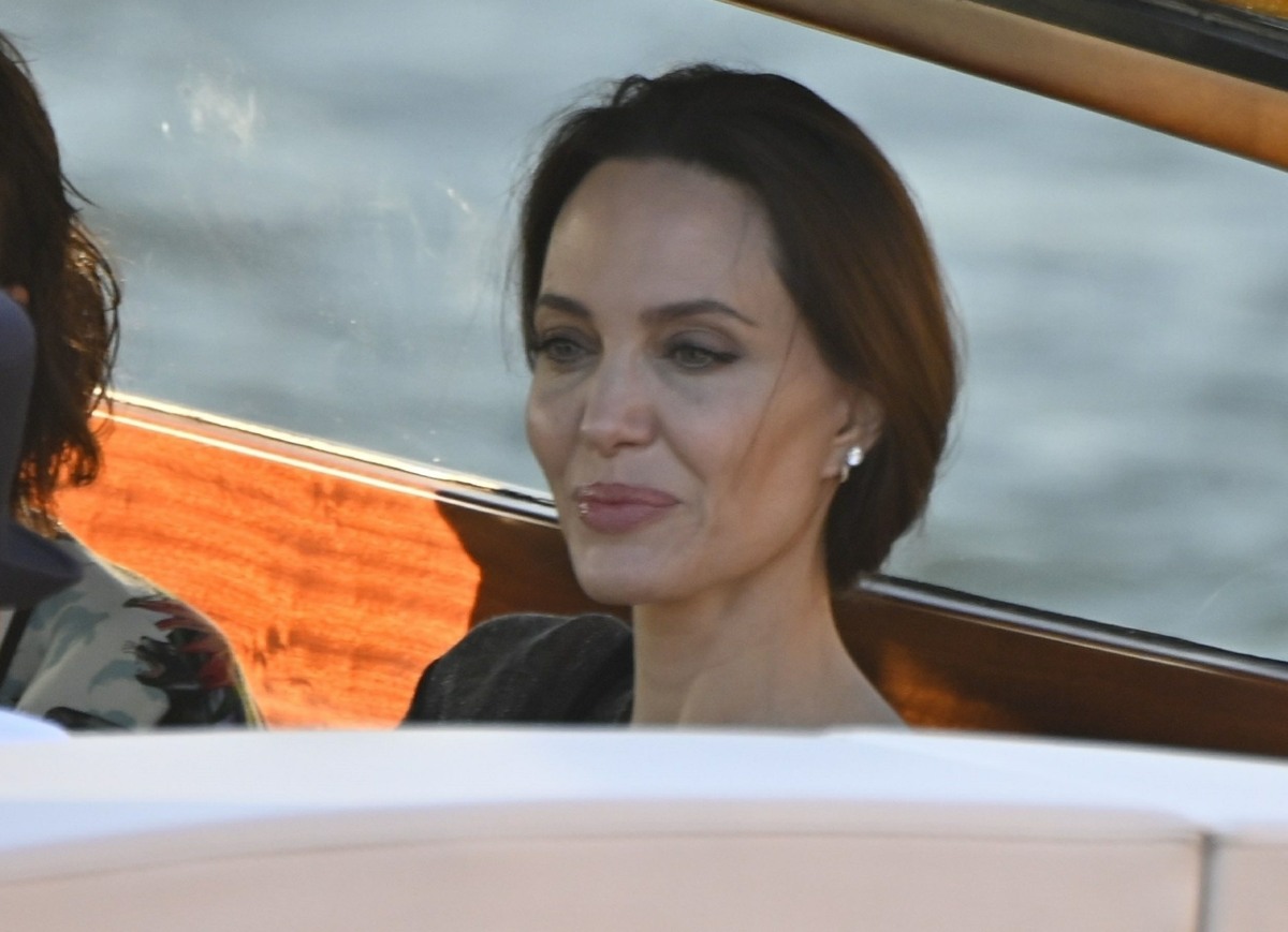 The American Actress Angelina Jolie spotted in the city of love and heads to a restaurant via a taxi boat in Venice.