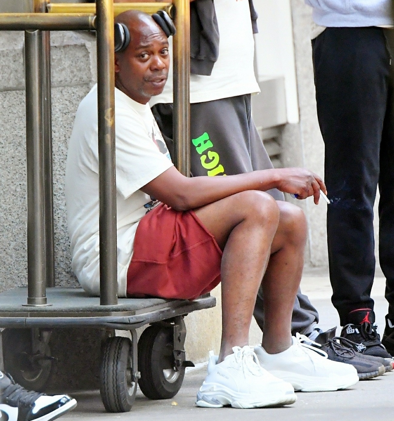 Dave Chappelle has a laugh with friends while out in NYC
