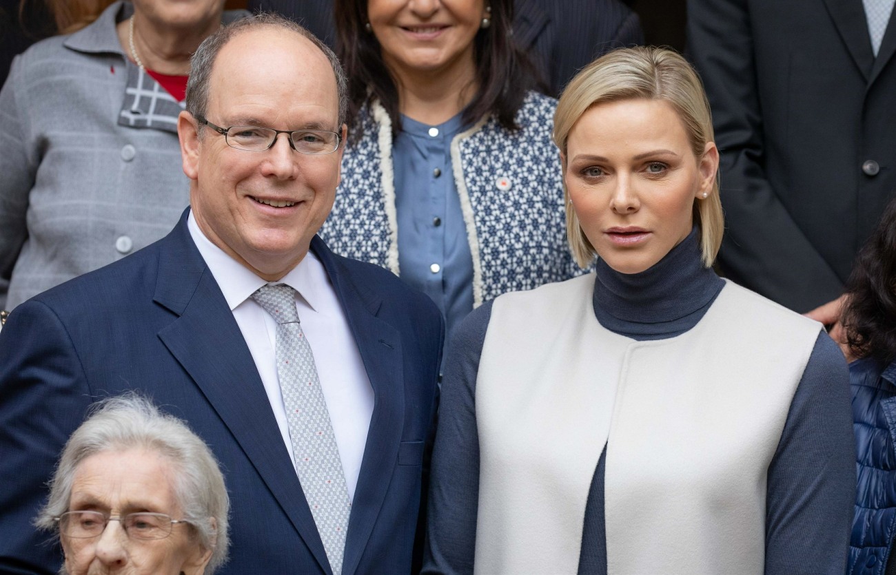 Prince Albert II and Princess Charlene of Monaco present gifts to the disadvantaged at the Monegasque Red Cross office