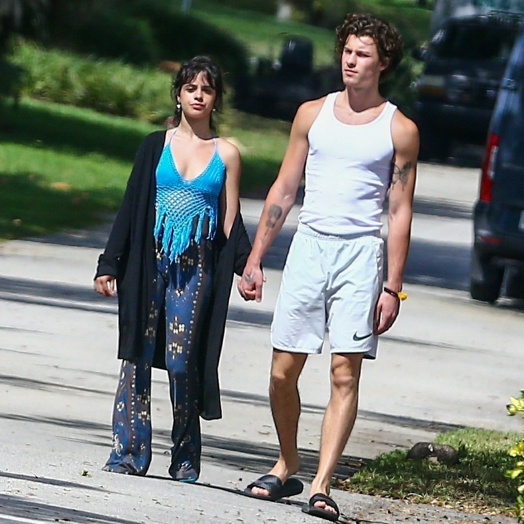 Camila Cabello tries to shake Shawn Mendes awake as couple step out for morning walk WITHOUT their coffee!