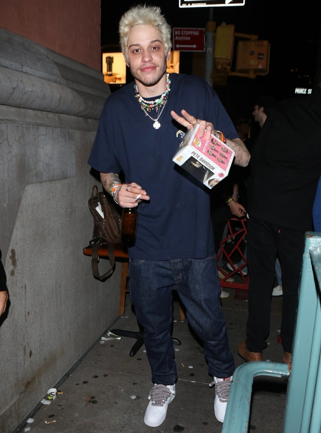 Pete Davidson enjoys a cigarette while out partying in NYC