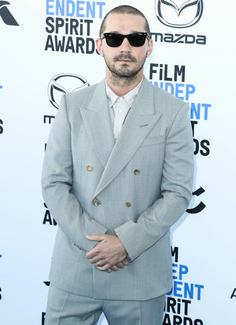 Actor Shia LaBeouf wearing Gucci with Ray-Ban sunglasses arrives at the 2020 Film Independent Spirit...
