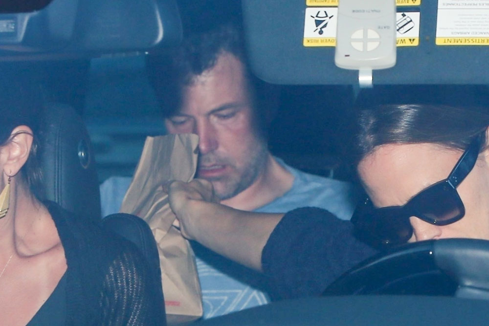 Jennifer Garner handing Ben a bag of fast food before driving him to rehab