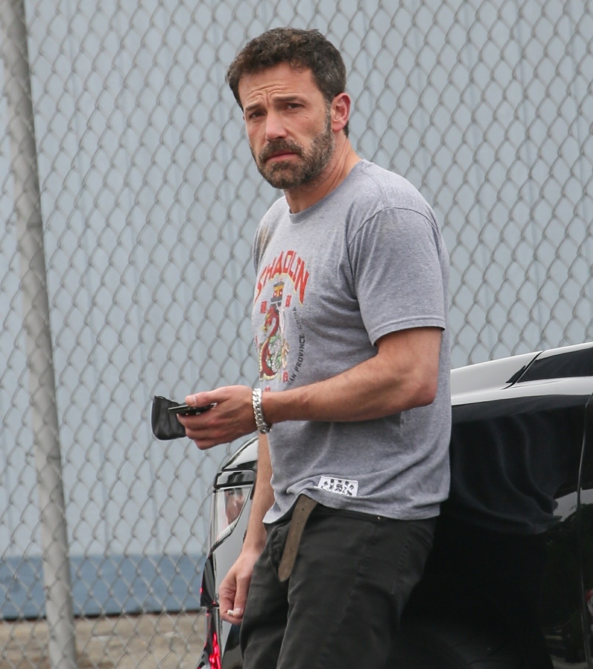 Ben Affleck smokes while Samuel finishes swimming practice
