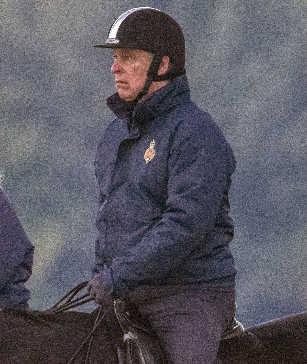 Prince Andrew spotted going for an early morning ride with a groom in Windsor