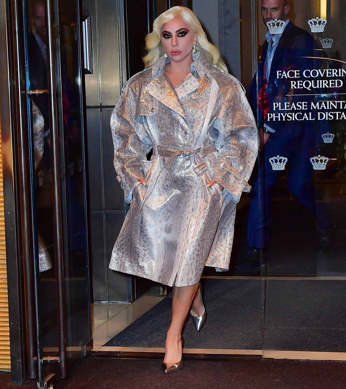 Lady Gaga stuns in silver overcoat out in NYC