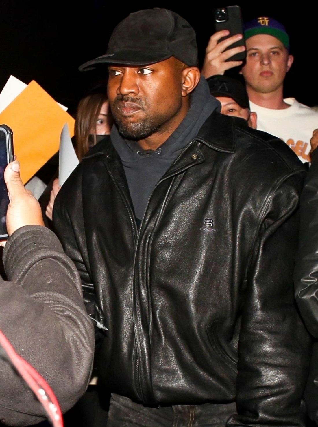 Kanye West causes quite the commotion as fans mob him while out for the night in Los Angeles!