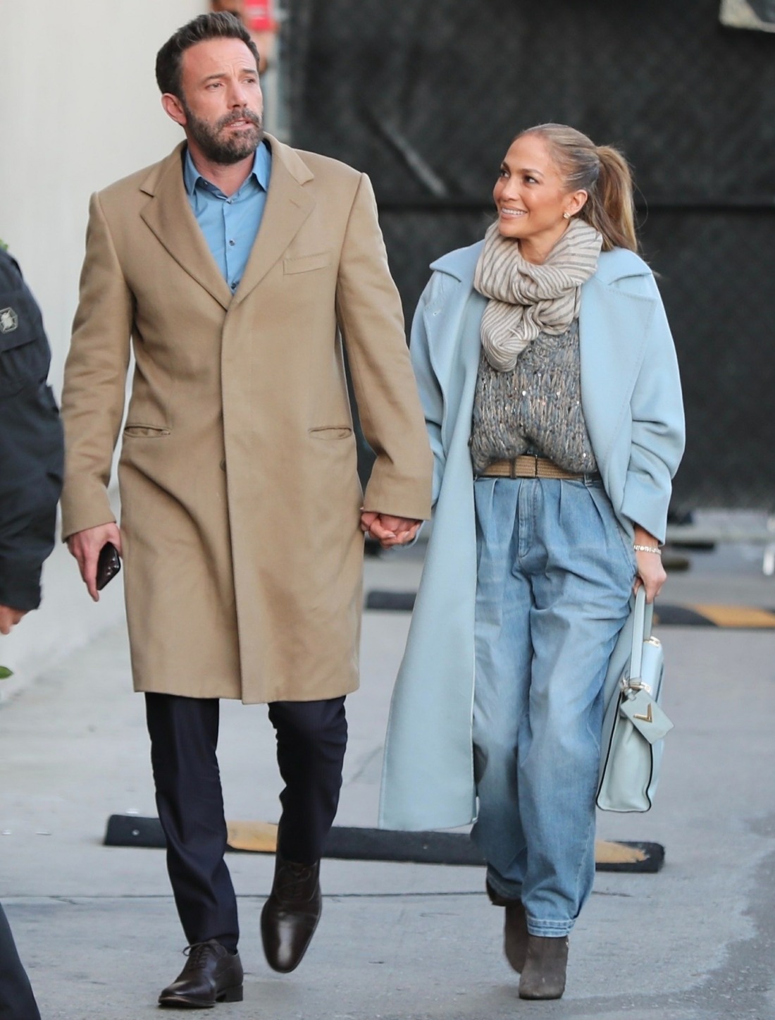 Ben Affleck and Jennifer Lopez hold hands arriving at Jimmy Kimmel Live!