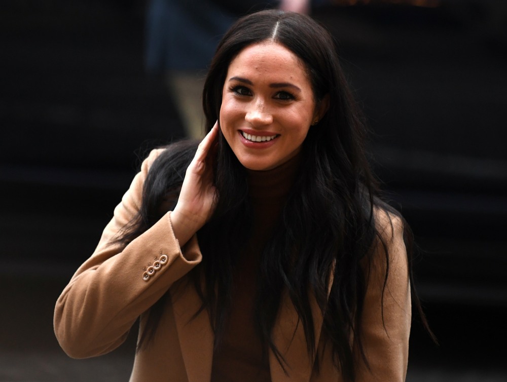 Britain's Meghan, Duchess of Sussex reacts as she arrives to visit Canada House, in London on January 7, 2020, in thanks for the warm Canadian hospitality and support they received during their recent stay in Canada.