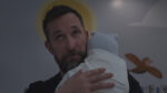 Noah Wyle holding baby Jane Doe
