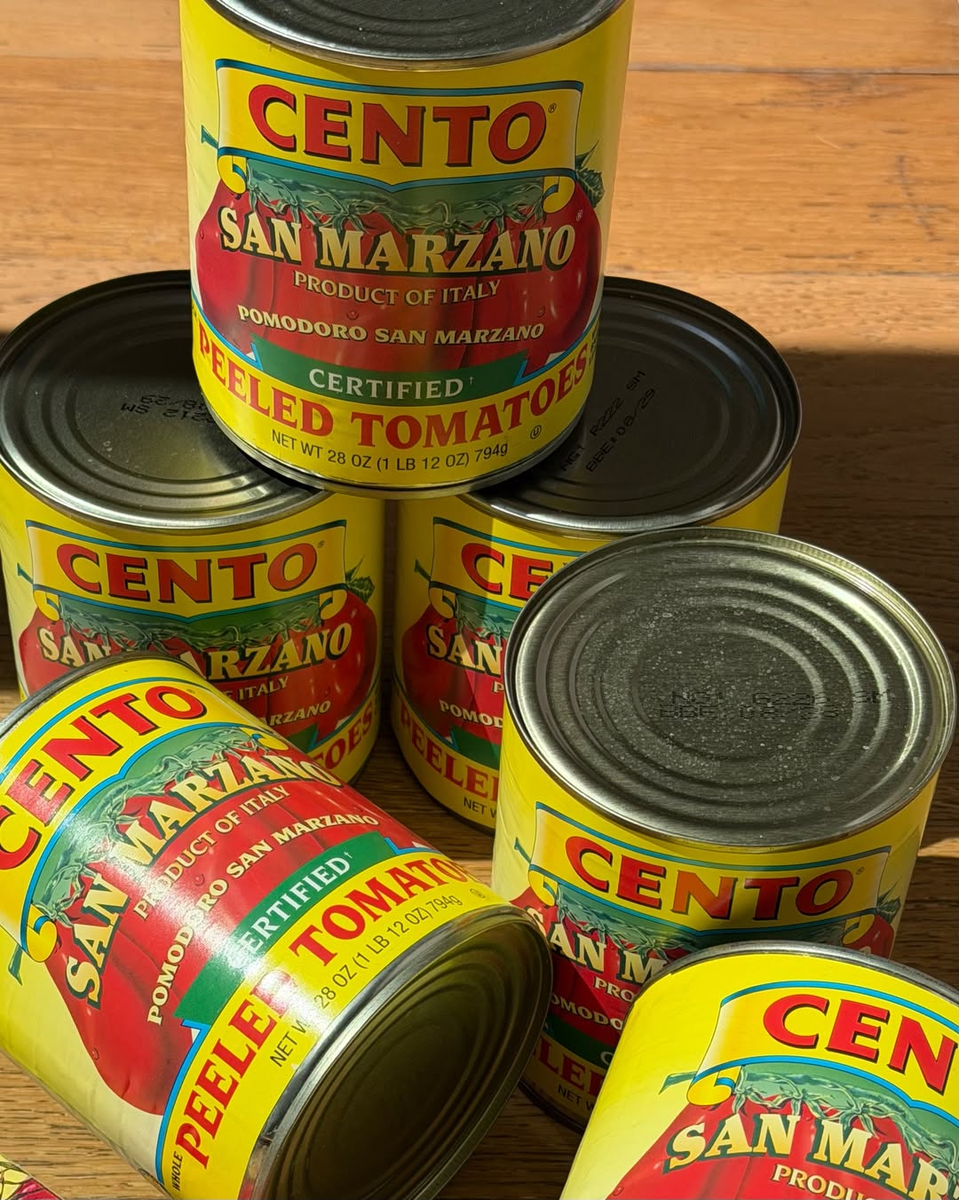 Cento tomato cans via Instagram