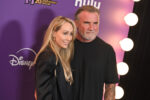 Tish Cyrus and Dominic Purcell at the World Premiere of Disney s Hannah Montana 20th Anniversary Special at El Capitan Theatre in Los Angeles. March 23, 2026